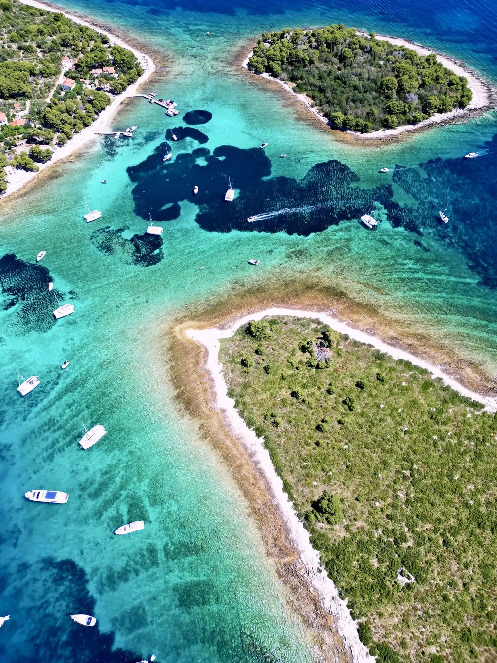 Aerial panoramic view of Blue Lagoon at Drvenik Veliki Island, seen on a private boat tour from Split, Croatia.