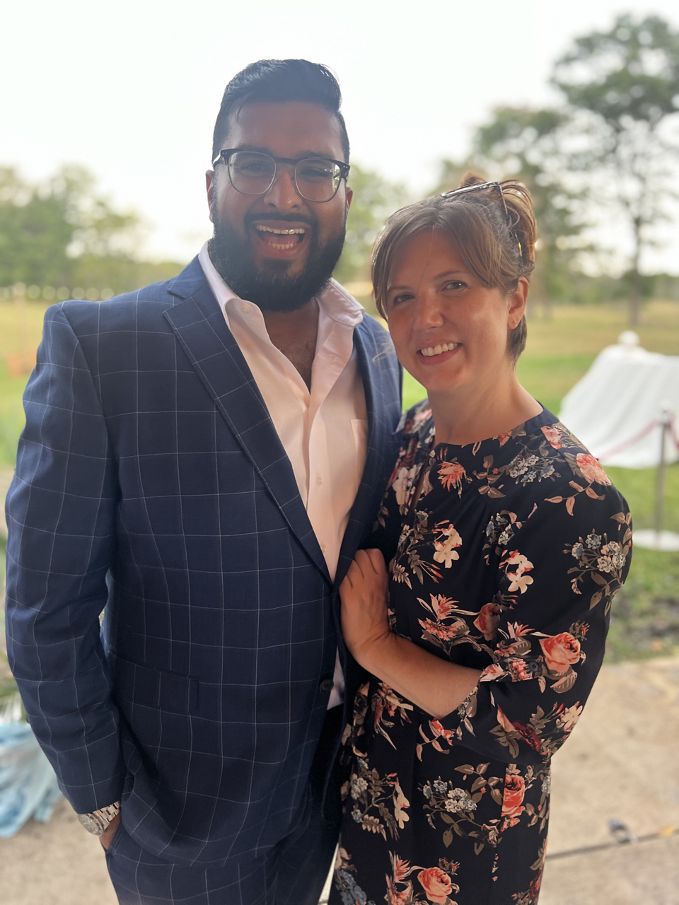 a man and woman standing next to each other