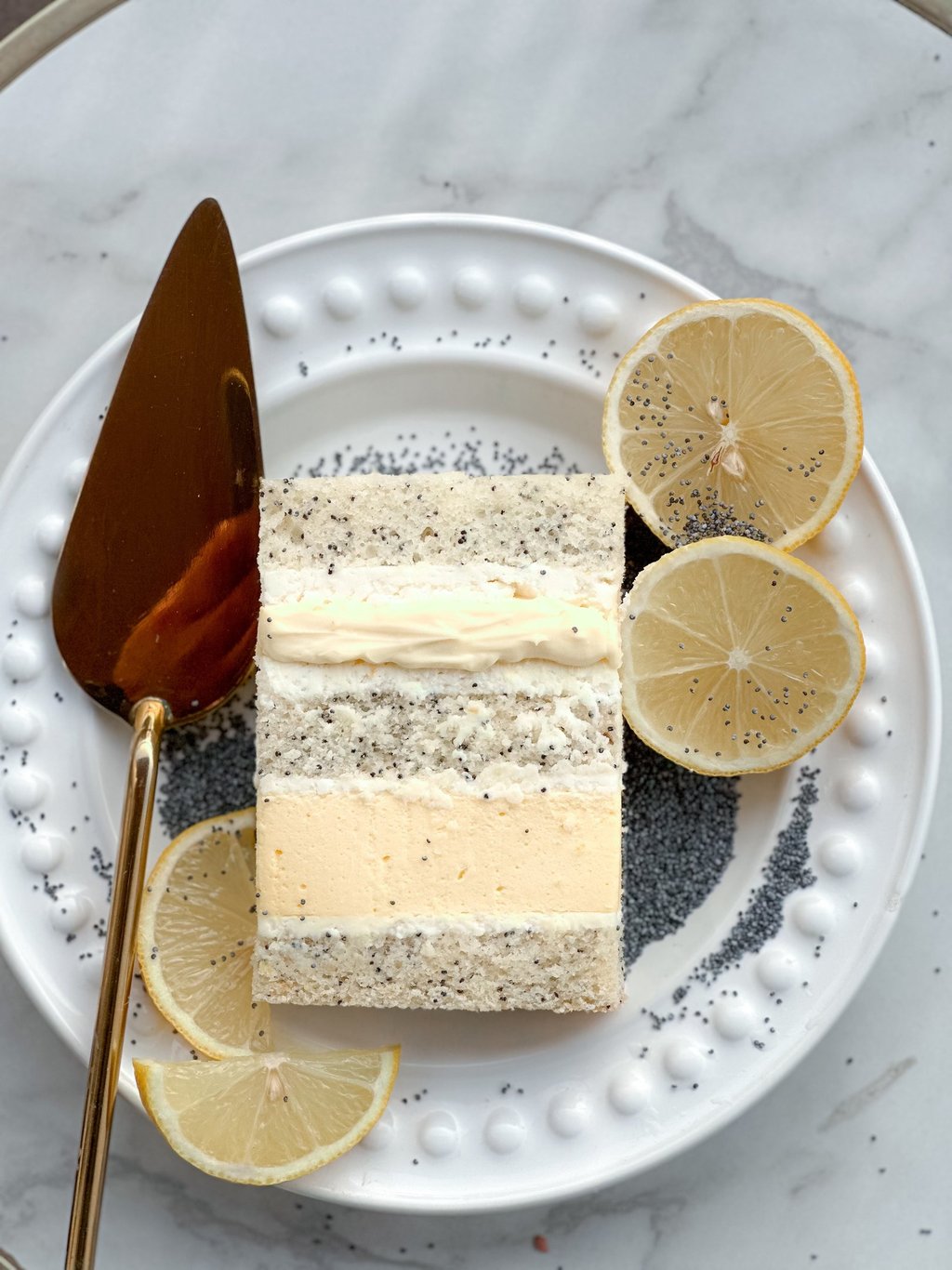 a slice of lemonade cake with lemonade and lemonade