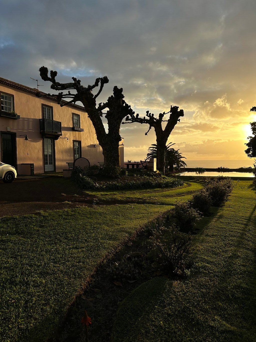 sunset in front of a Portugese manor house