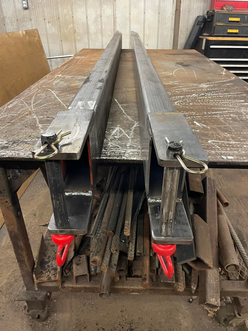 fork lift fork extensions showing safety pins lock