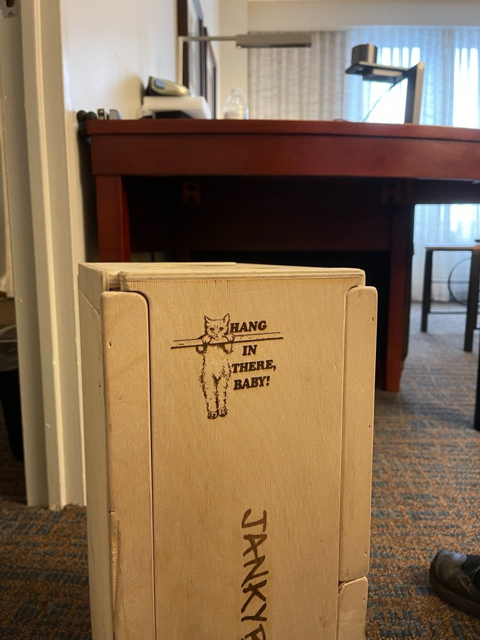 a refrigerator with a box of food inside of it