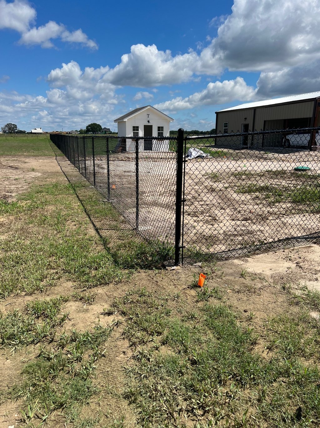 Black Metal Fence in a Backyard
