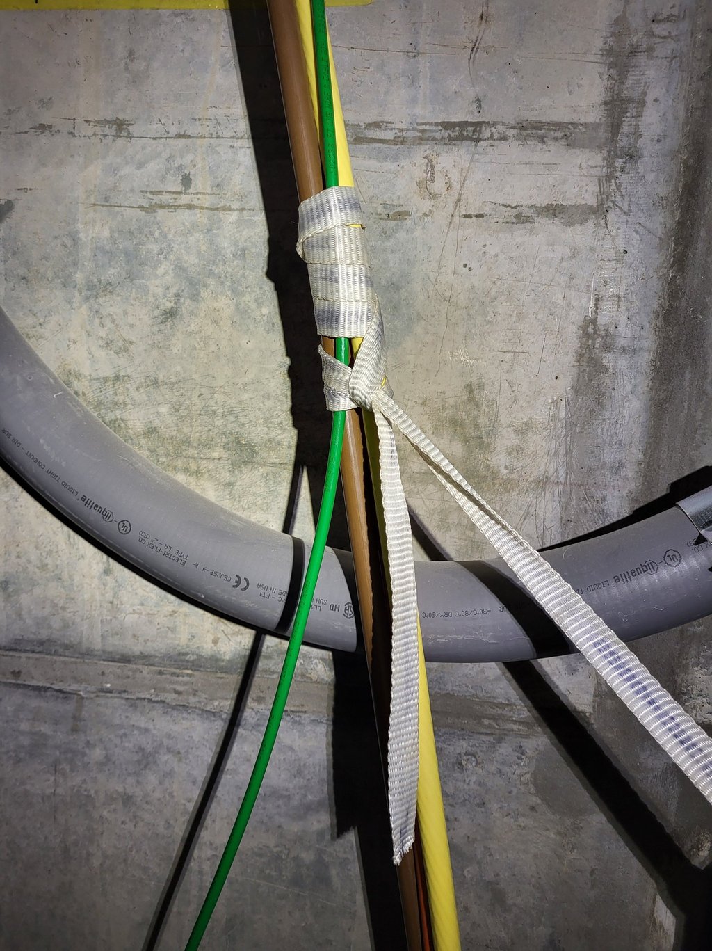 Schwäbisch Hitch pulling in 3/0 THHN high voltage wires with Mule Tape 