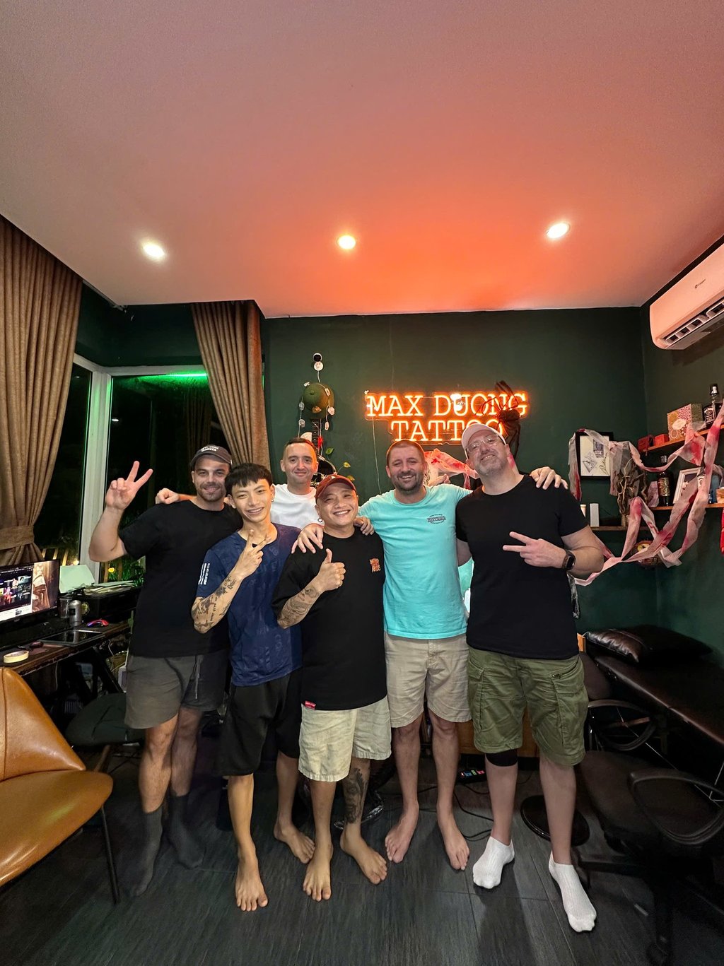 happy customers in Max Duong tattoo shop