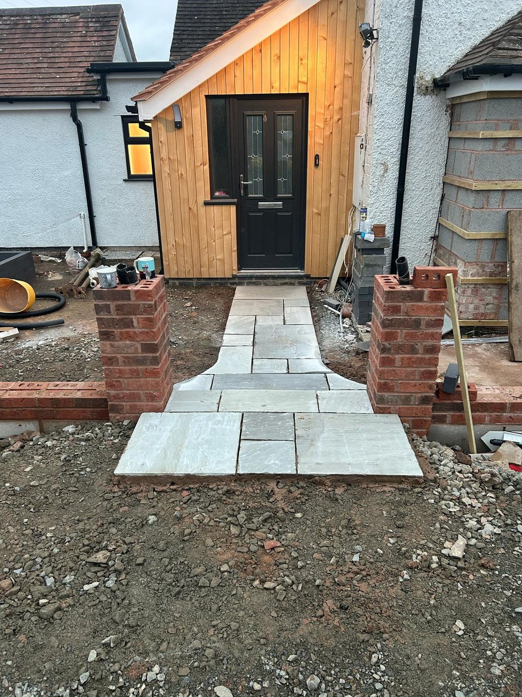 brick wall being built at a malvern home