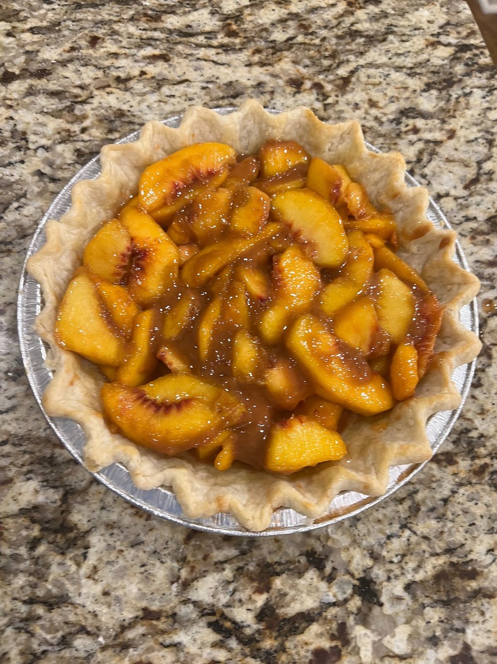 layer of peaches and bourbon reduction