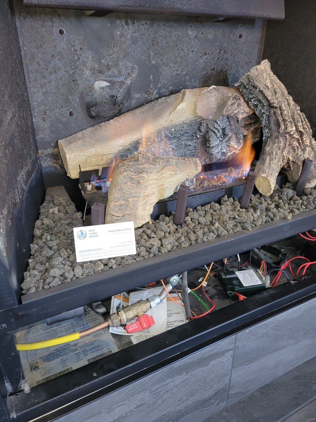 blue flame works repairing a  fireplace