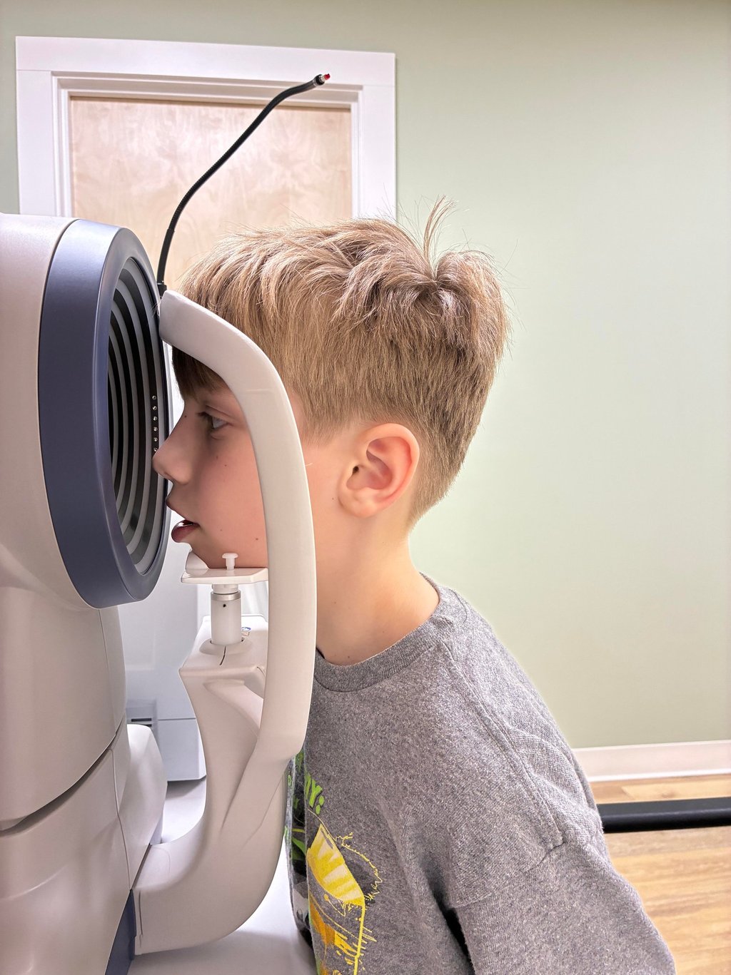 Child being examined for myopia management in Southborough