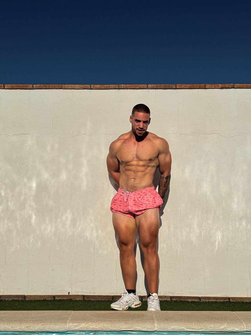 a man in swimsuit  with a muscular body