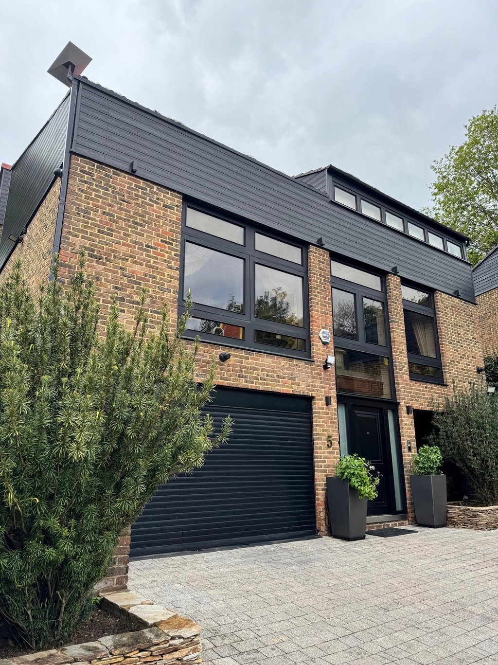 Residential Exterior Renovation & Restoration and  new Composite cladding installation 