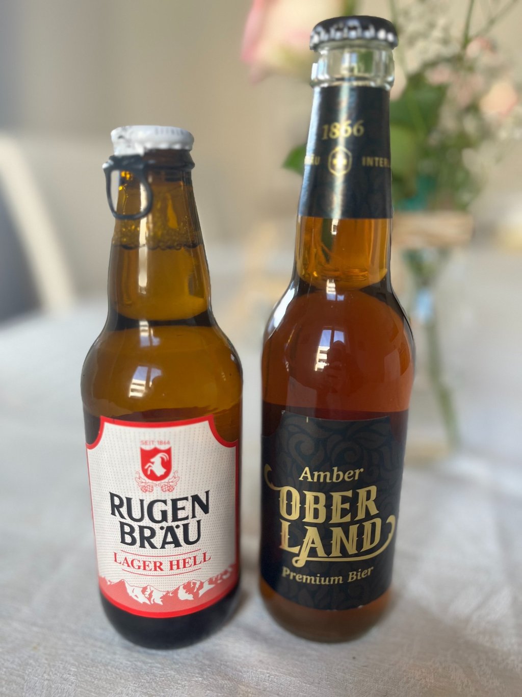 two beer bottles with beer from Rugenbrau Brewery in Interlaken Switzerland