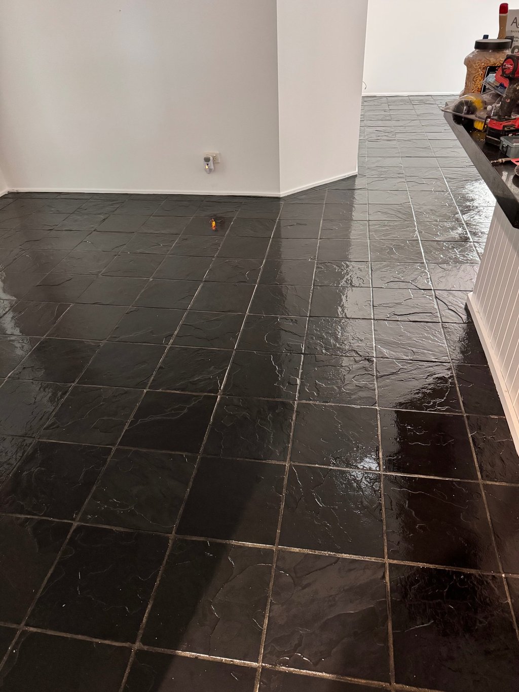 Tile cleaning and grout cleaning improving shine and hygiene in residential space.