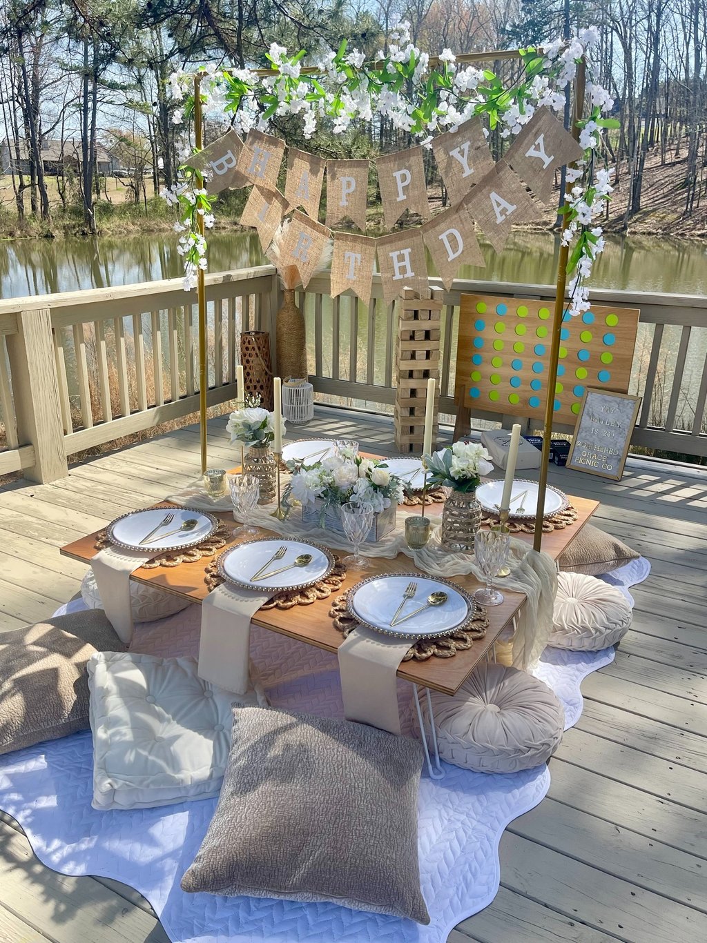 Northeast georgia luxury picnic with florals & elegant Happy Birthday gathering celebration banner
