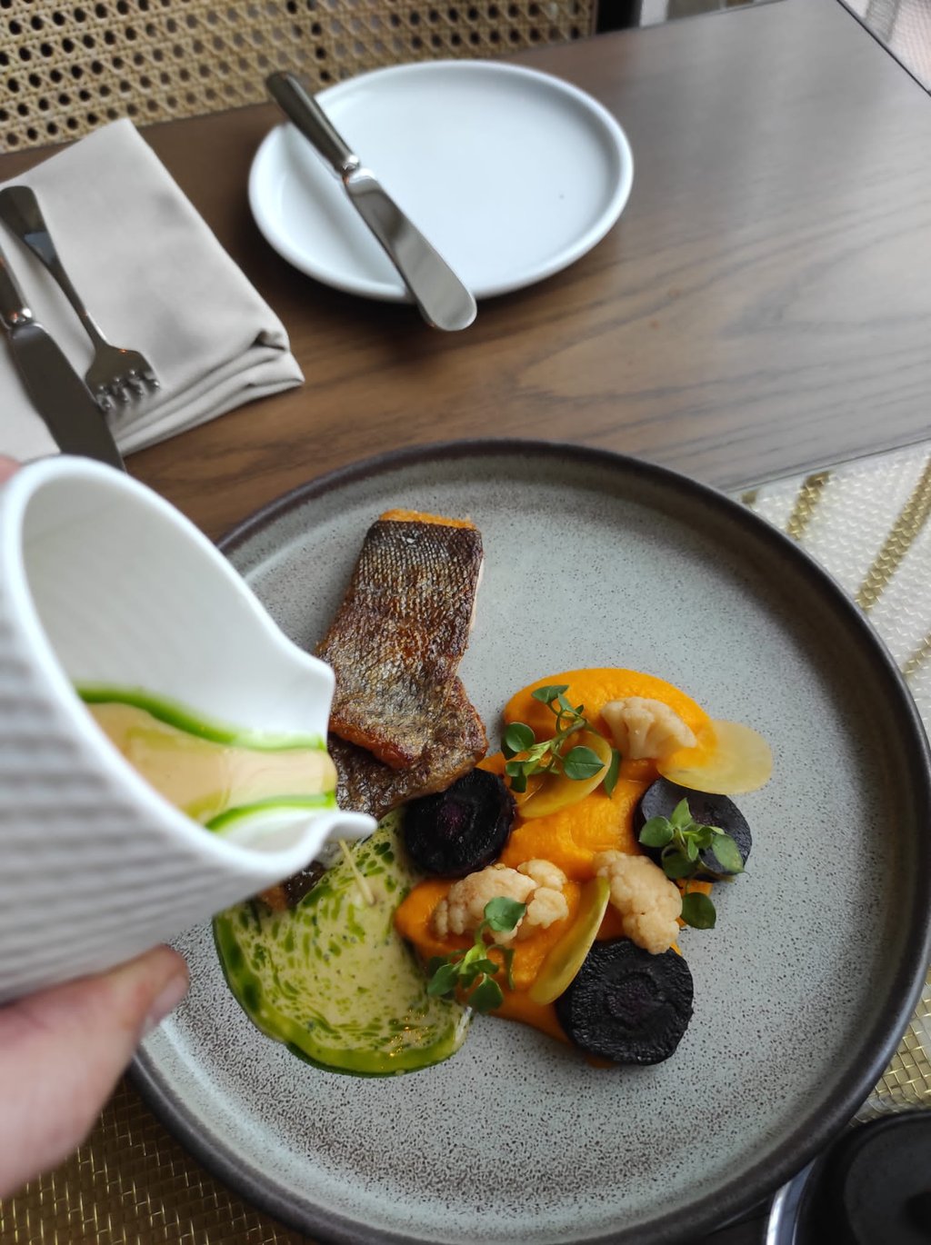 grilled fish with carrot puree and split butter sauce