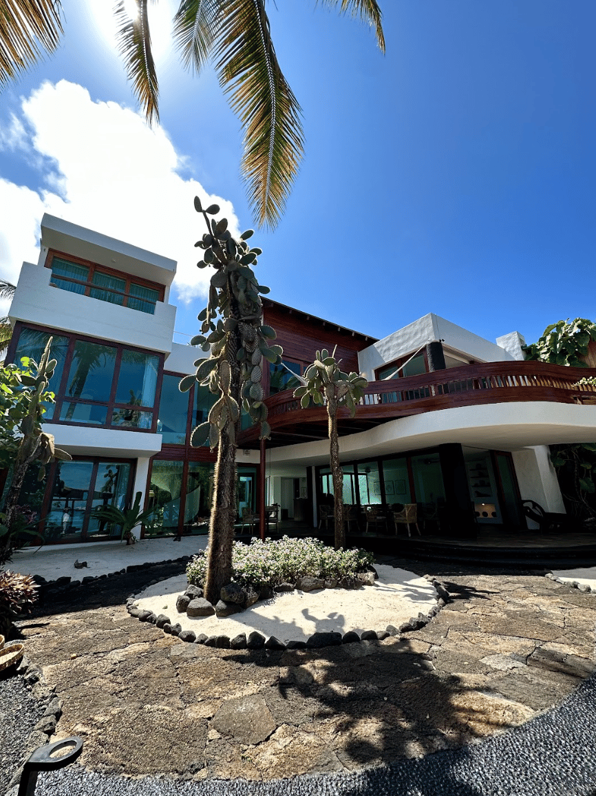 Exterior view of Villa Escalesia Galápagos, a contemporary oceanfront boutique hotel surrounded by n