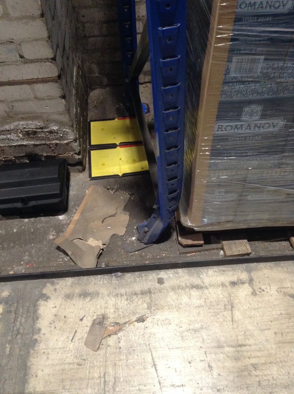 Damaged pallet racking upright requiring racking inspection