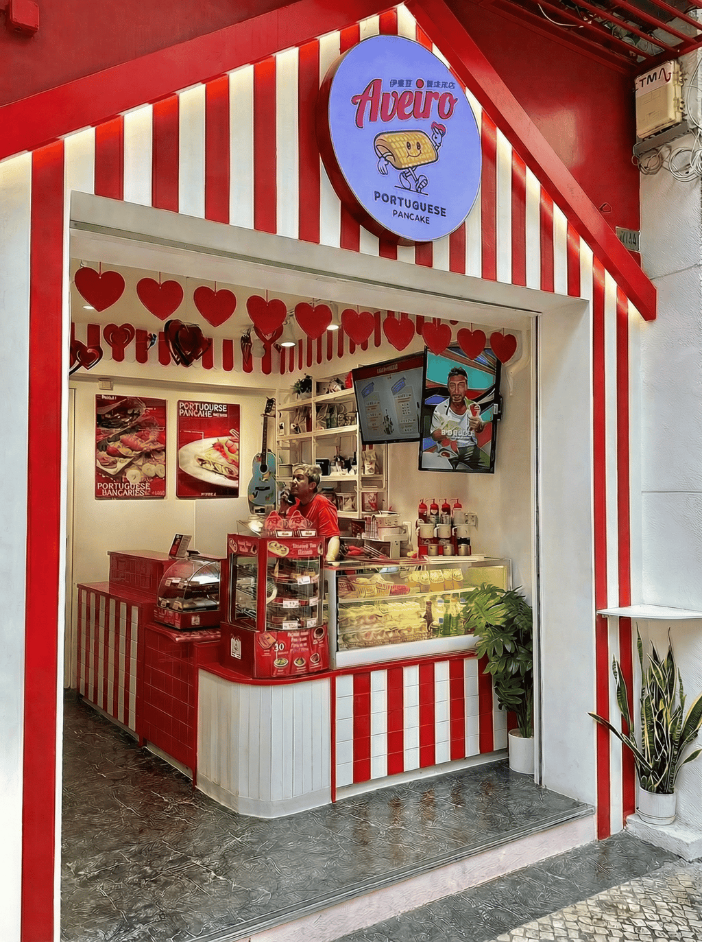 Aveiro Macau storefront with traditional red and white stripes on Rua dos Ervanários