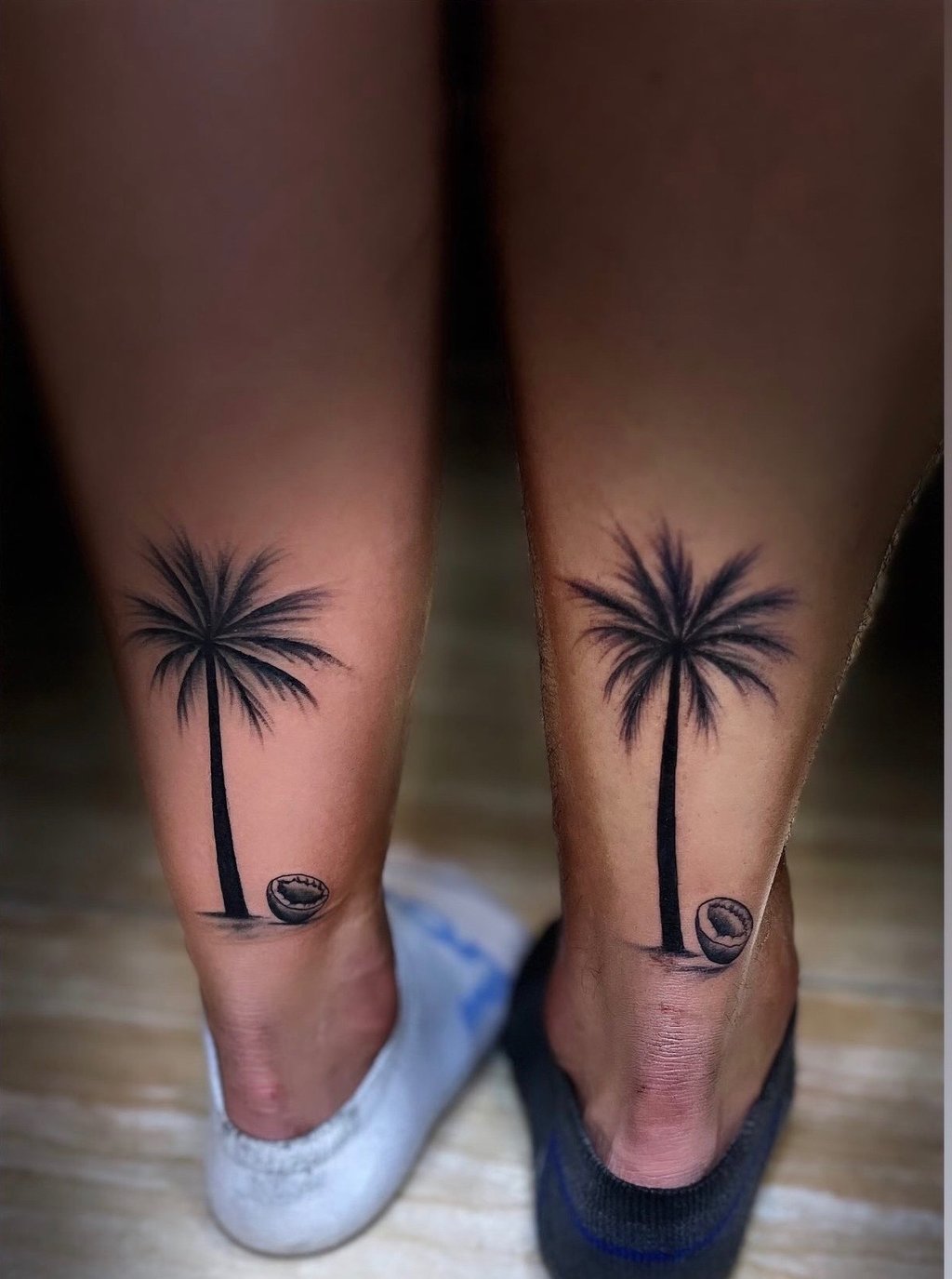 Palm tree tattoo in minimalist style on ankle — Hurghada Tattoo Studio
