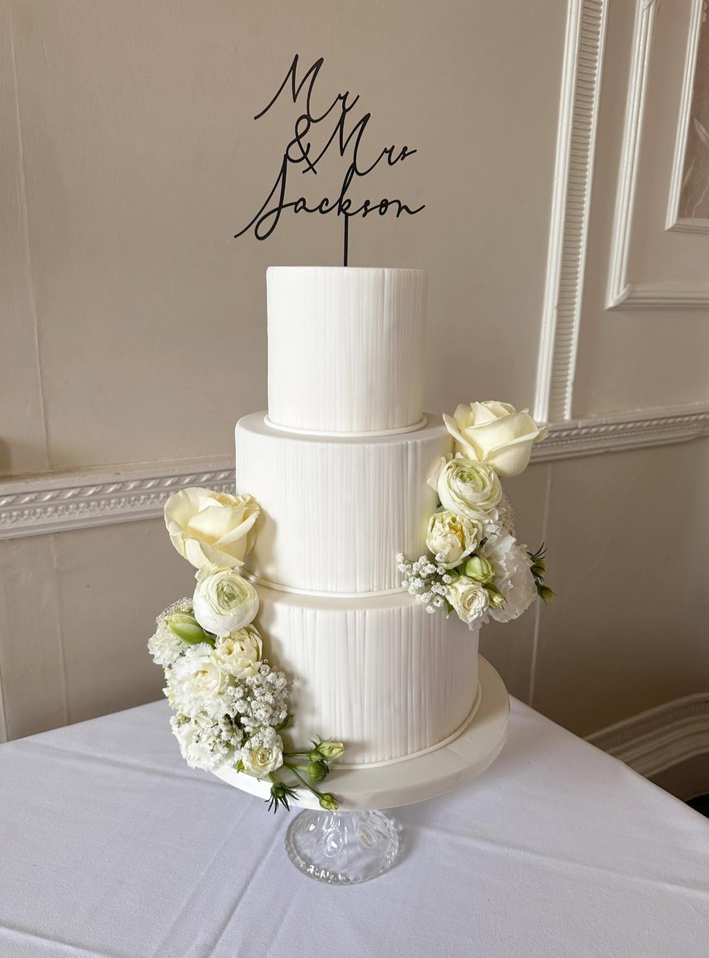 Iced 3 Tier Wedding Cake with Fresh Flowers By Sweetcupcakes Cakery