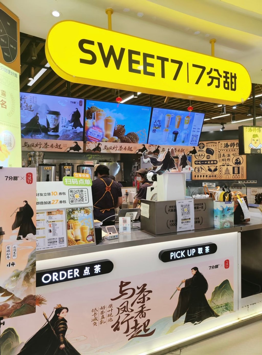 ClaraTech high-brightness digital signage window display installed in Sweet 7 retail store.