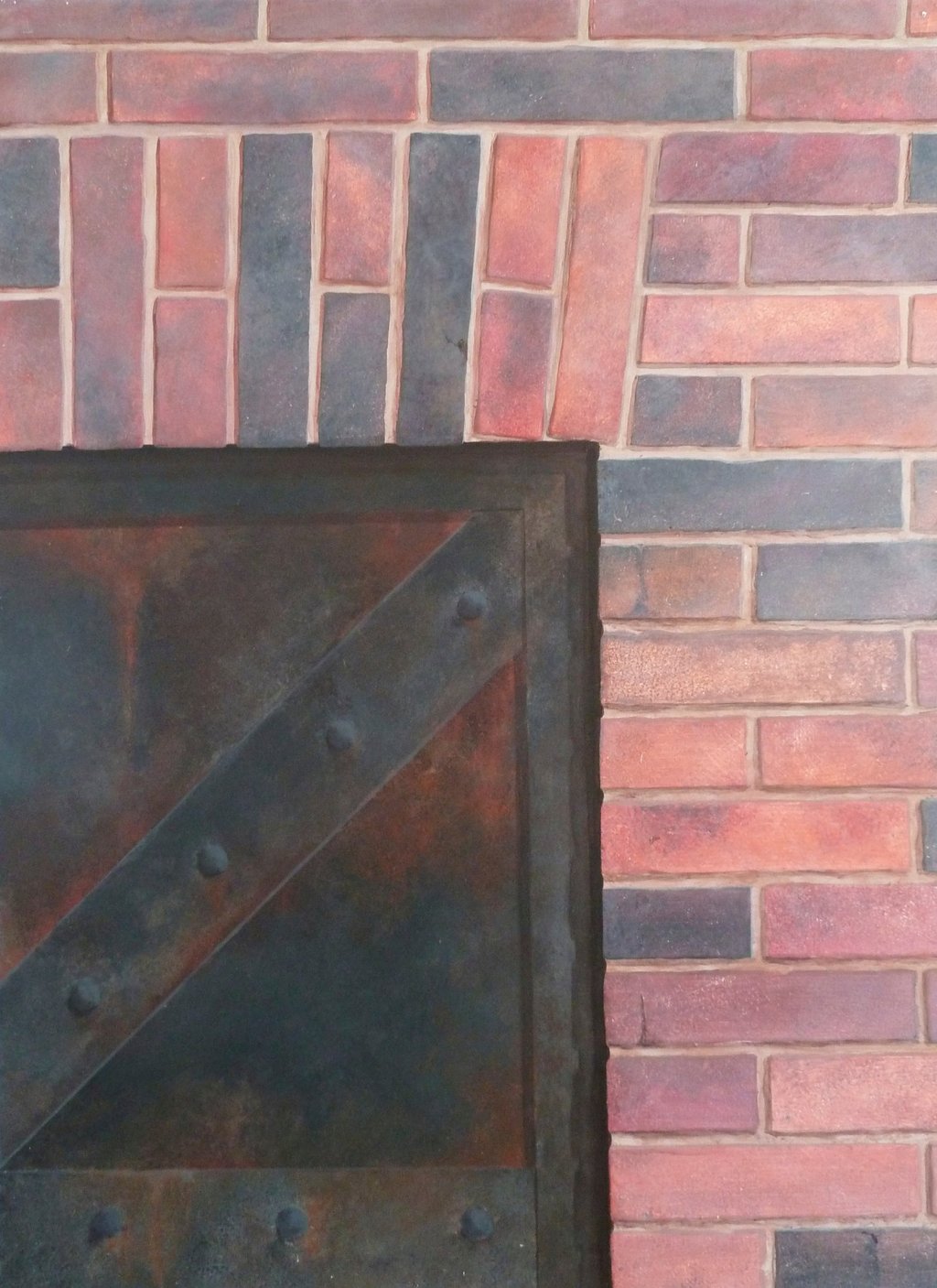 De fausses briques, une vieille porte de hangar rouillée, ce trompe-l'oeil créé une ambiance idéale pour un Escape Games ou p