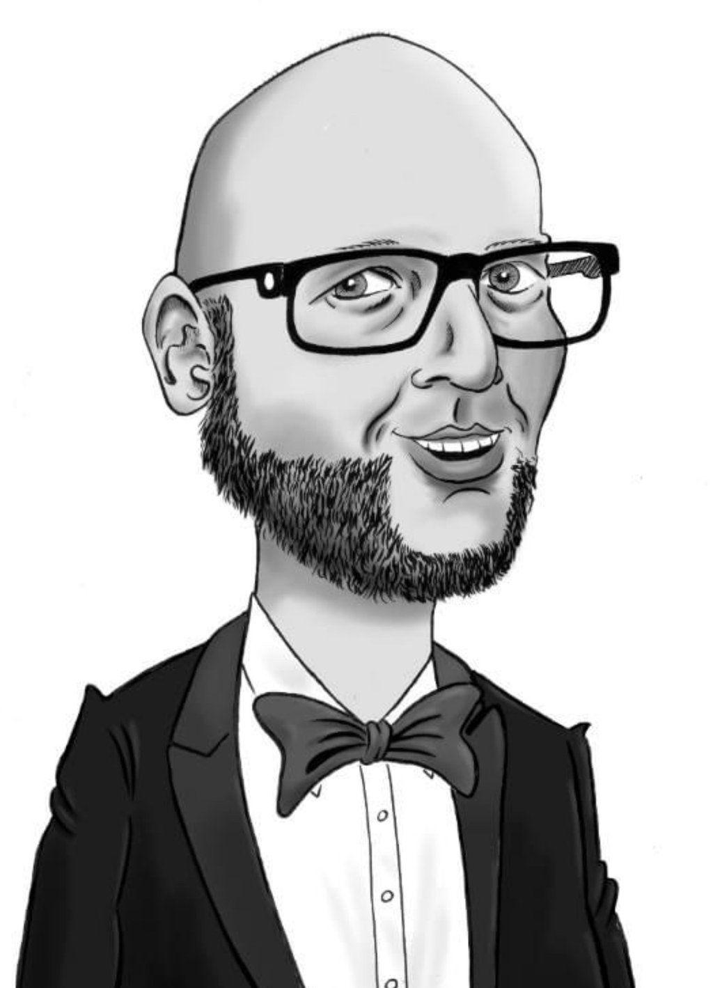 a man in a tuxedo suit and bow tie