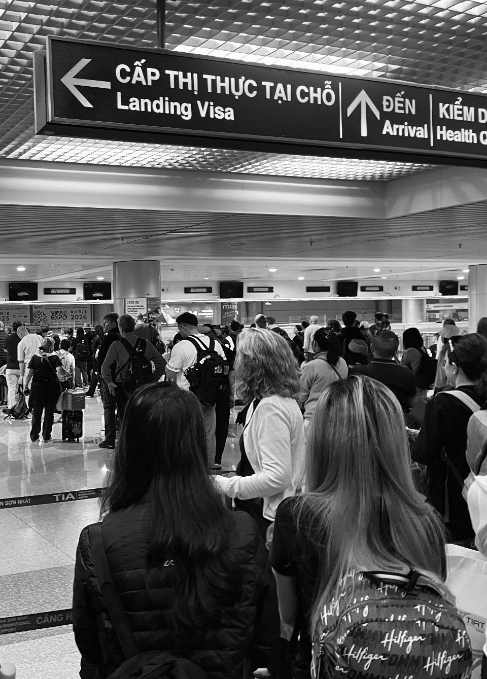 Travellers waiting at immigration in Ho Chi Minh City international airport