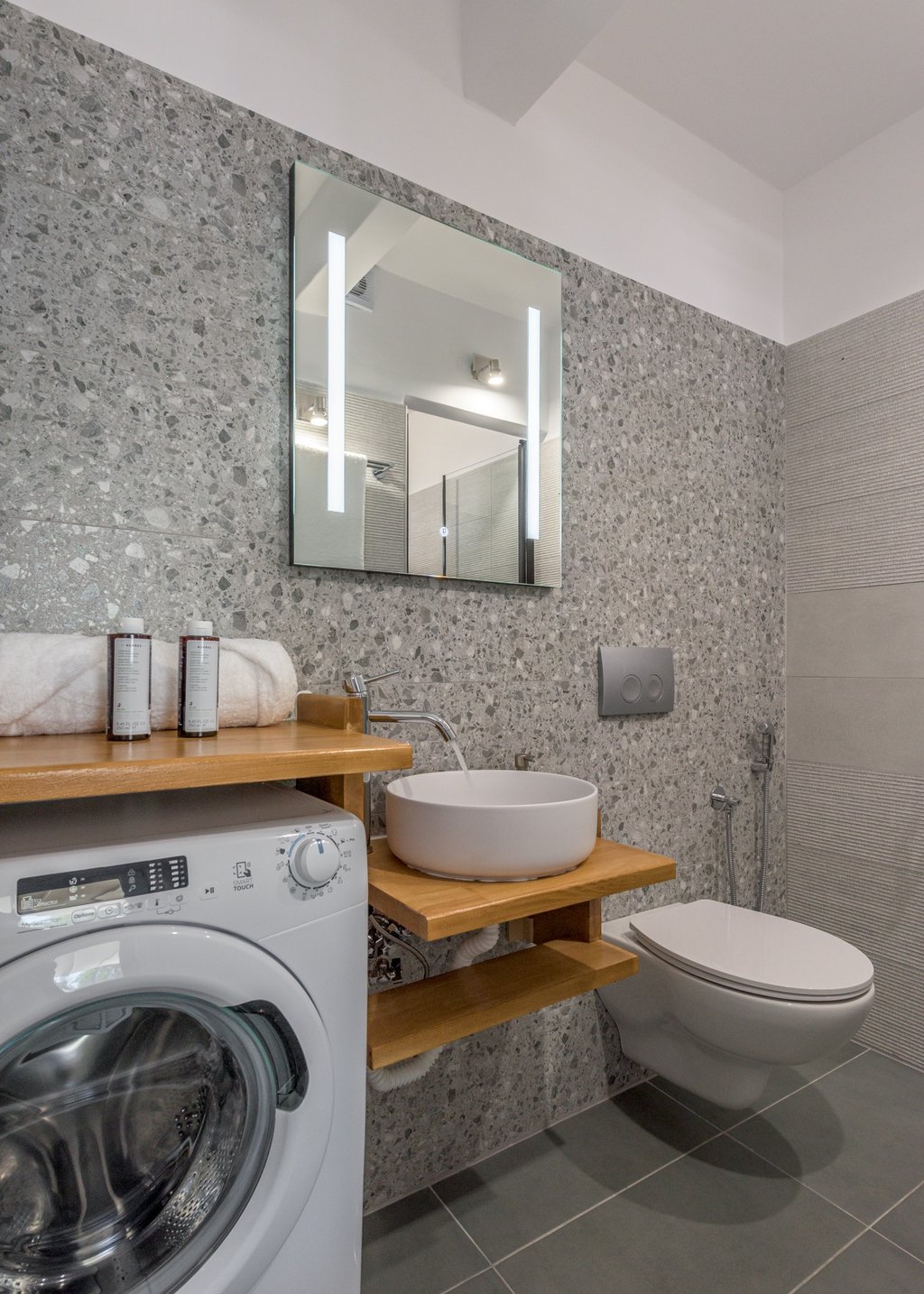 a bathroom with a washer 