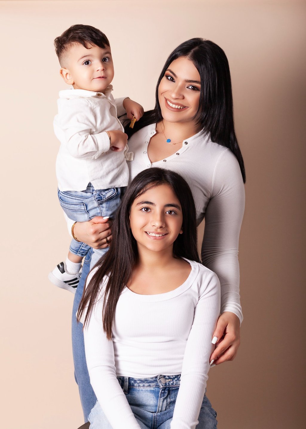 Fine art family portrait session in Sydney studio featuring mother and children