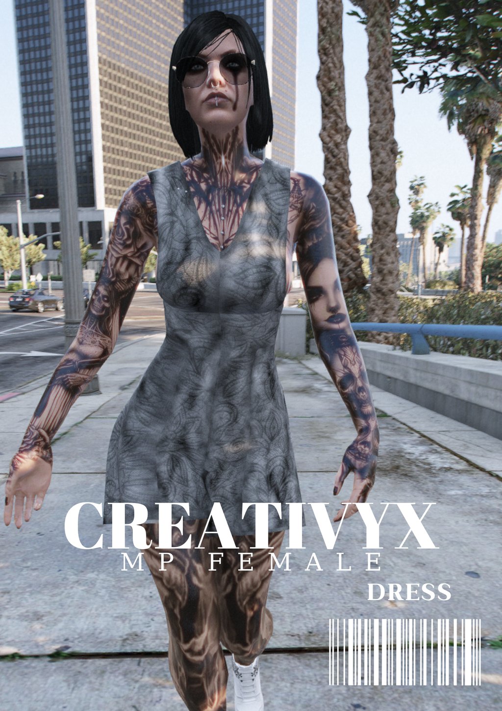 a woman in a dress with tattoos on her arm