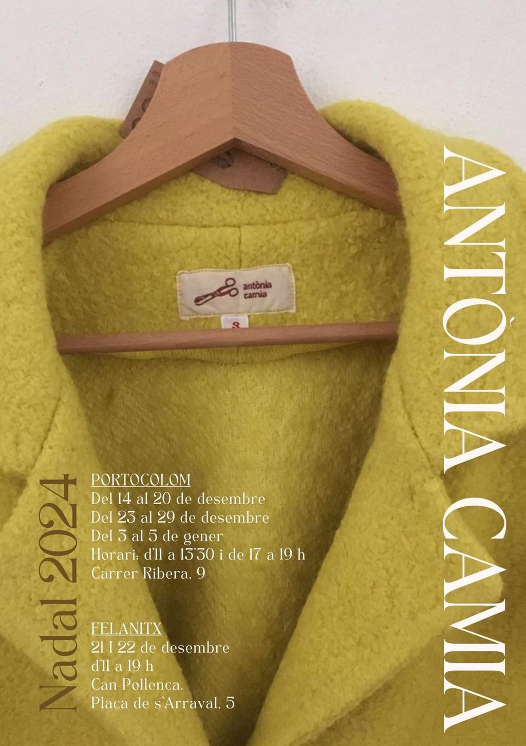 a yellow coat with a wooden hanger and a wooden hanger