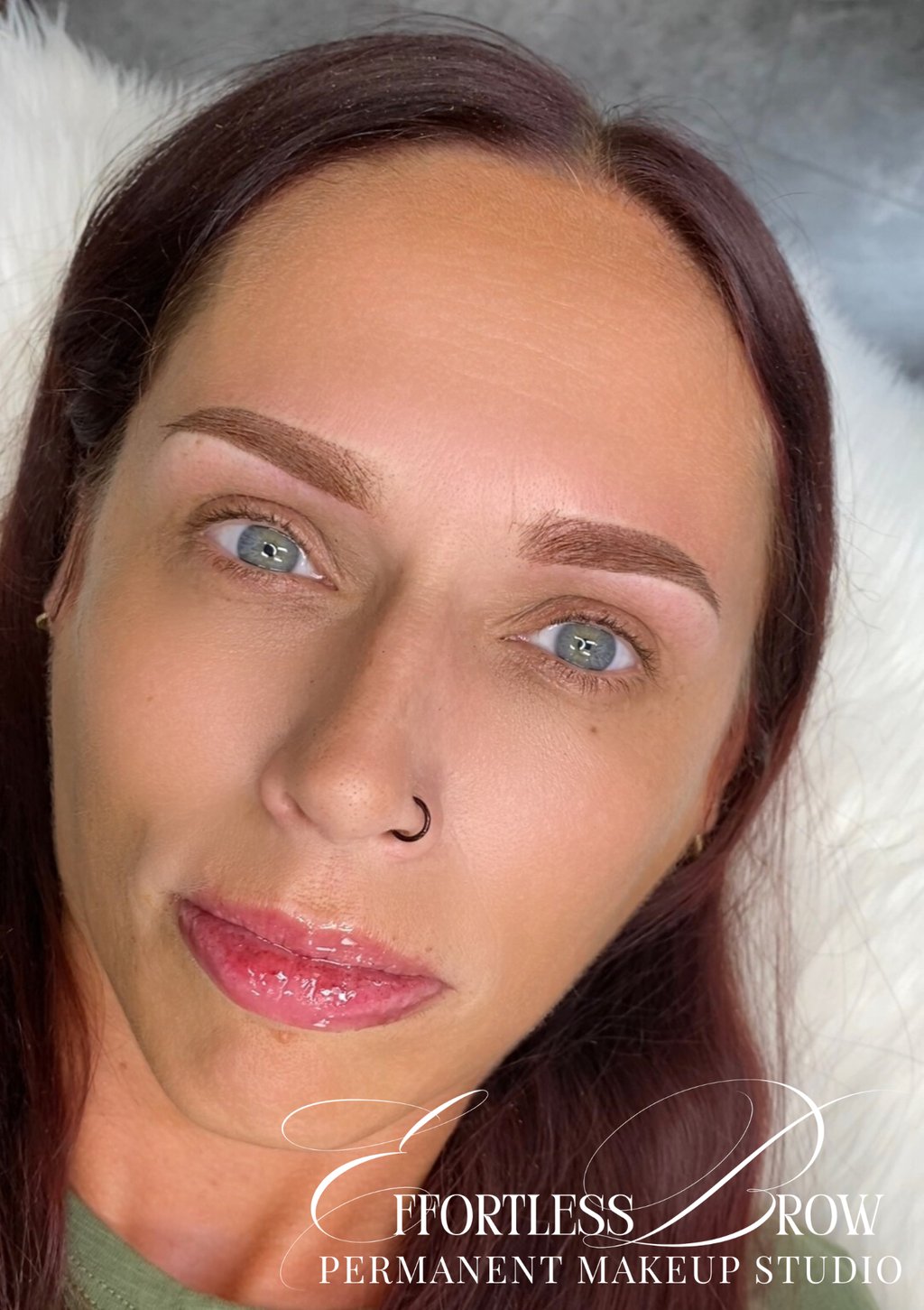 A close-up of a perfectly shaped powder brow right after the first session at our DFW studio.