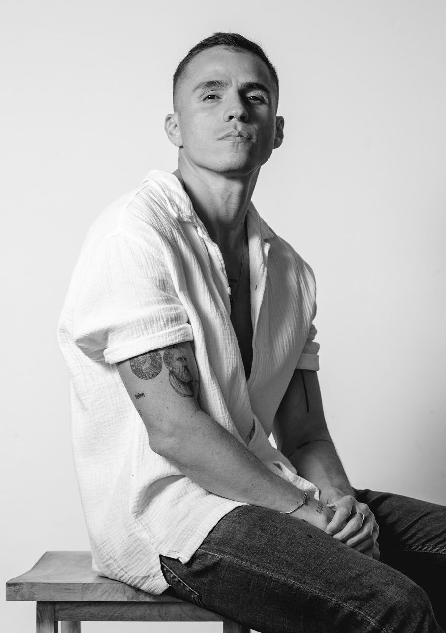 Miguel Cuartin in a studio setting, representing the creative mind and author behind Music and Ink