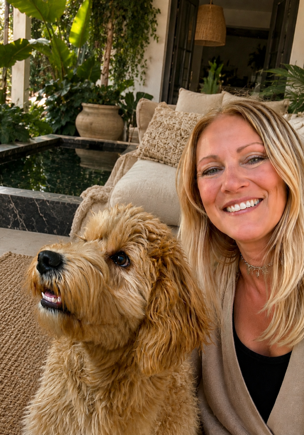 Nicole, professional pet sitter and founder of Bougie Tails, with a Goldendoodle client