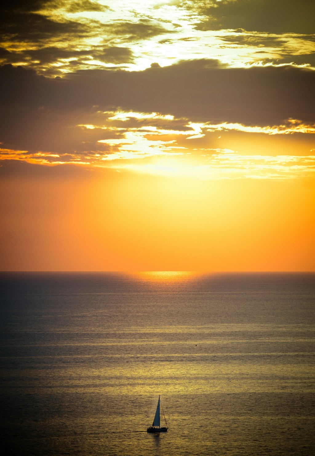 Boat sailing during a Greek sunset