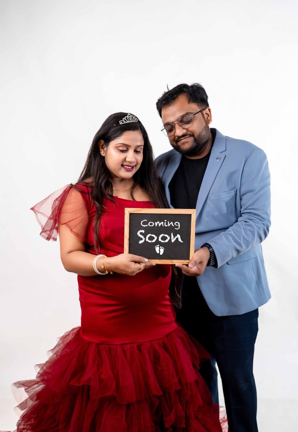 Emotional maternity portrait of soon-to-be parents