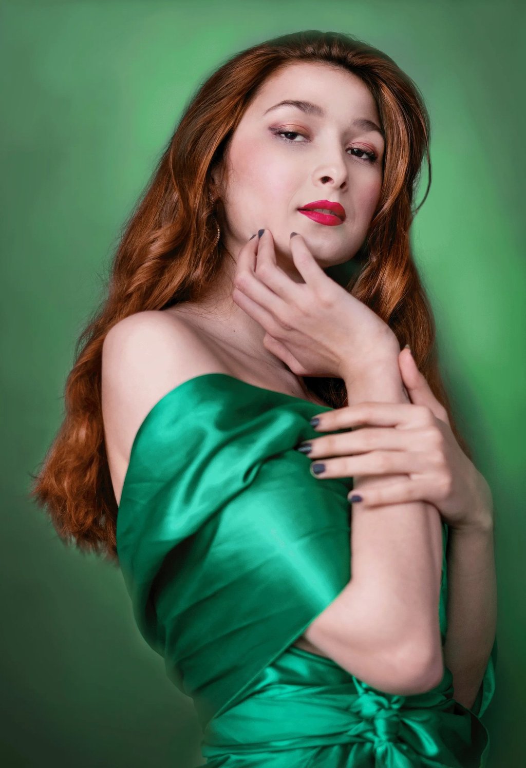 Painterly photo of a Turkish women with red hair and brown eyes in a green dress with a red lipstick