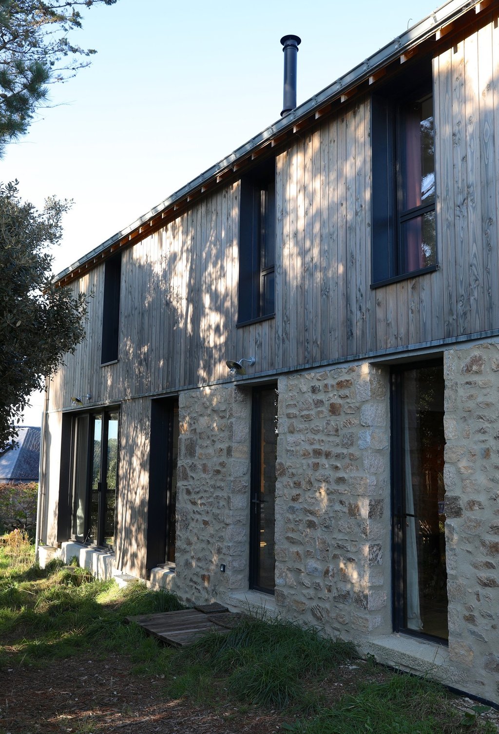 Maçonnerie ancienne à la chaux, surélévation en ossature bois
