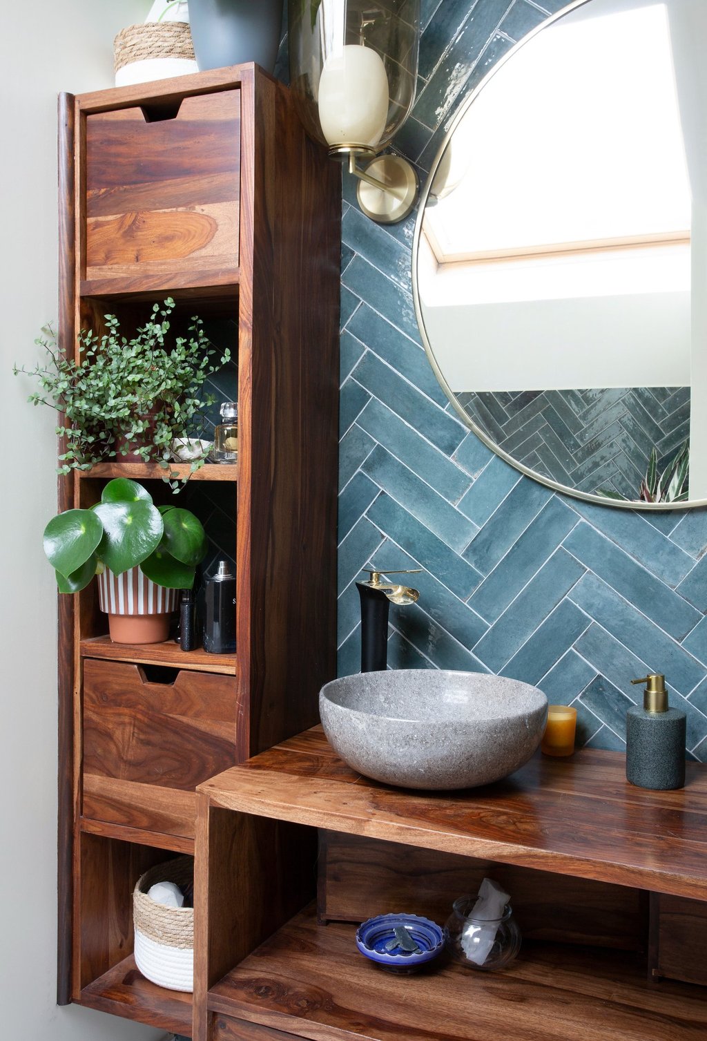 a bathroom with a sink and a wooden cabinet