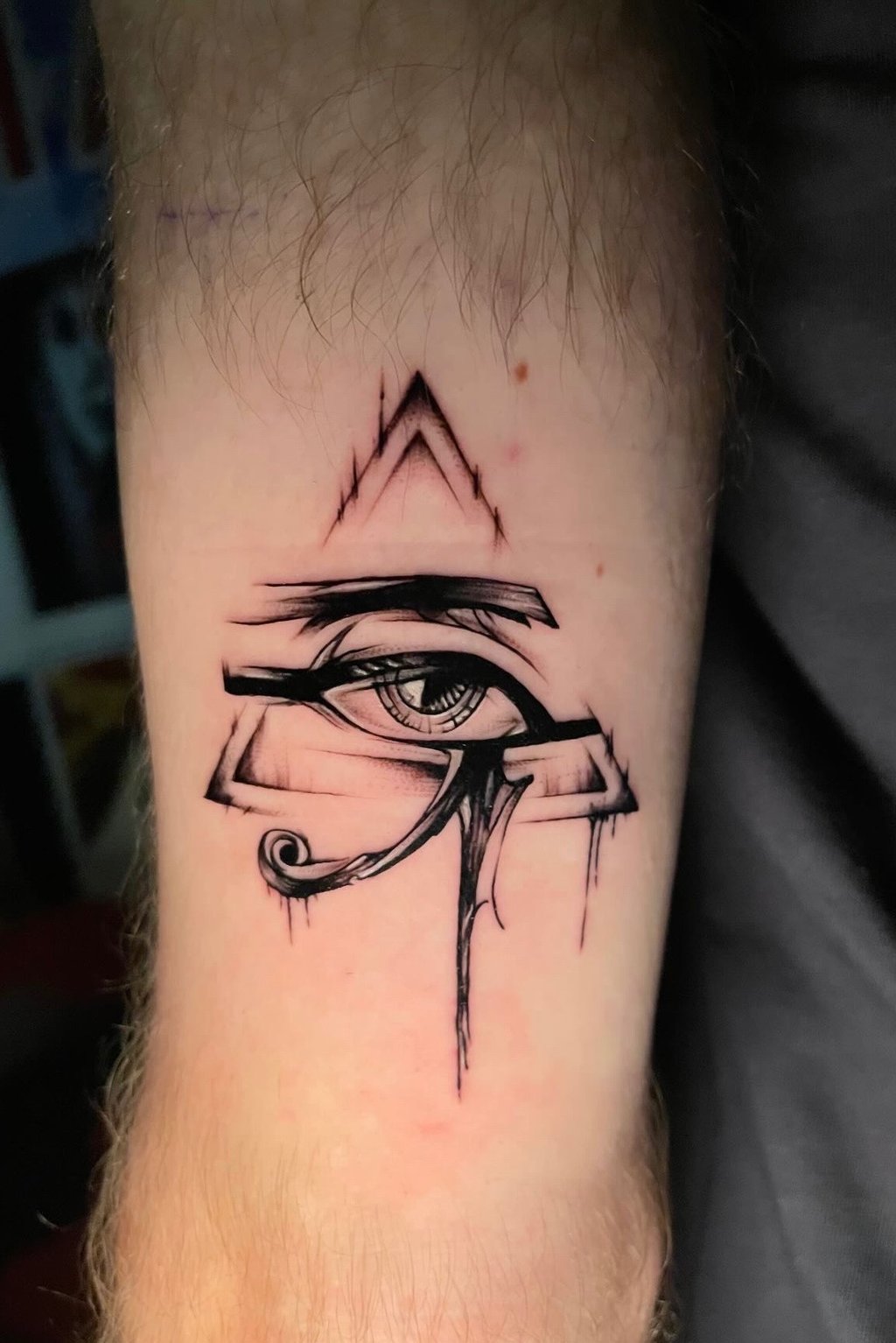 Eye of Horus tattoo in blackwork on forearm — Hurghada Tattoo Studio