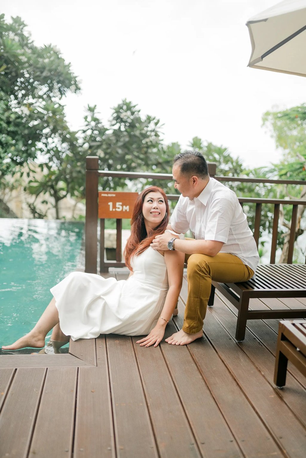 Selly couple portrait on the villa deck at Karma Kandara Uluwatu Bali  