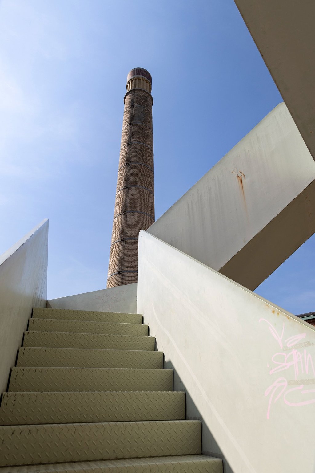 a staircase case with graffiti on it