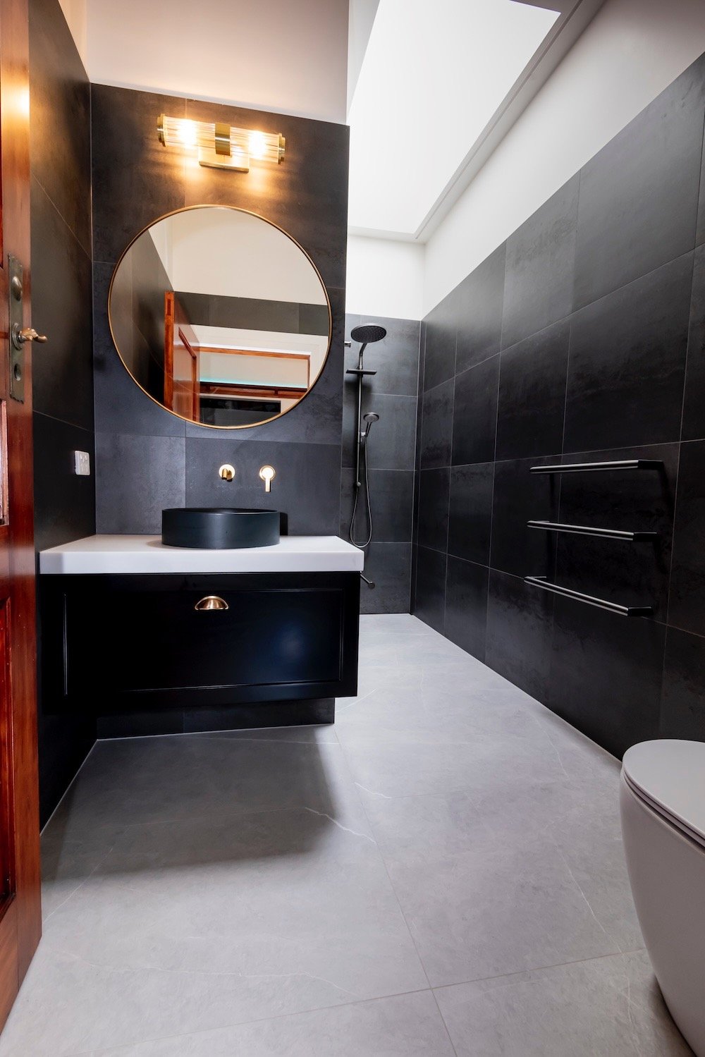 Designer Black Bathroom by Qualitas Builders in Auckland