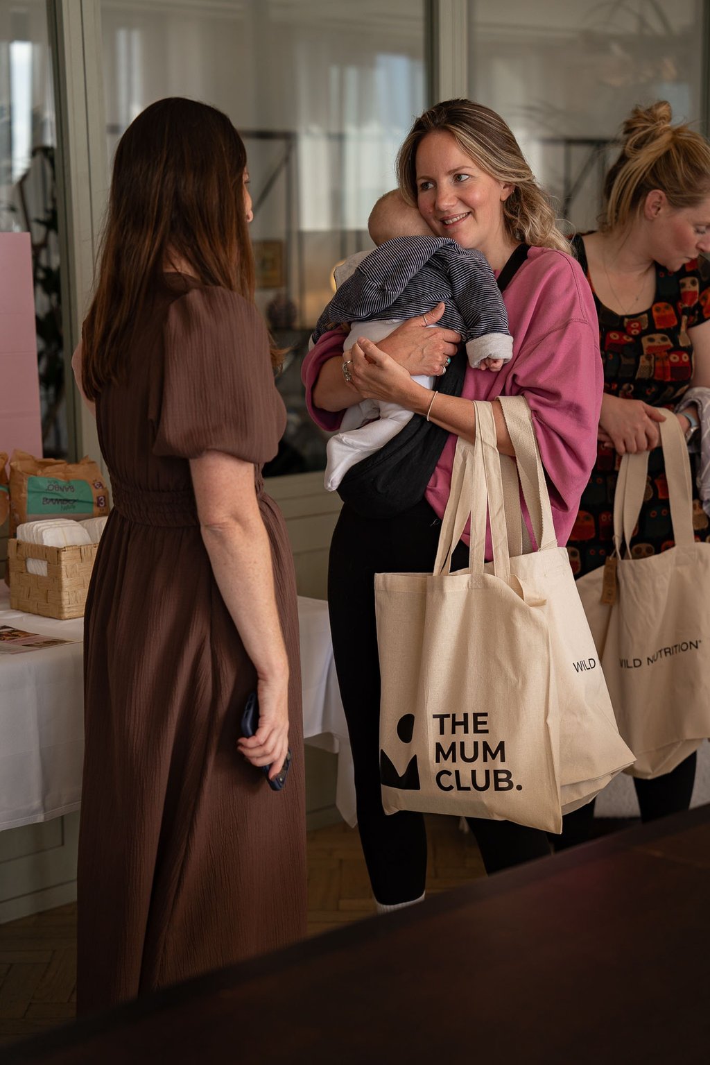 Mothers talking during the event photoshoot in Brighton