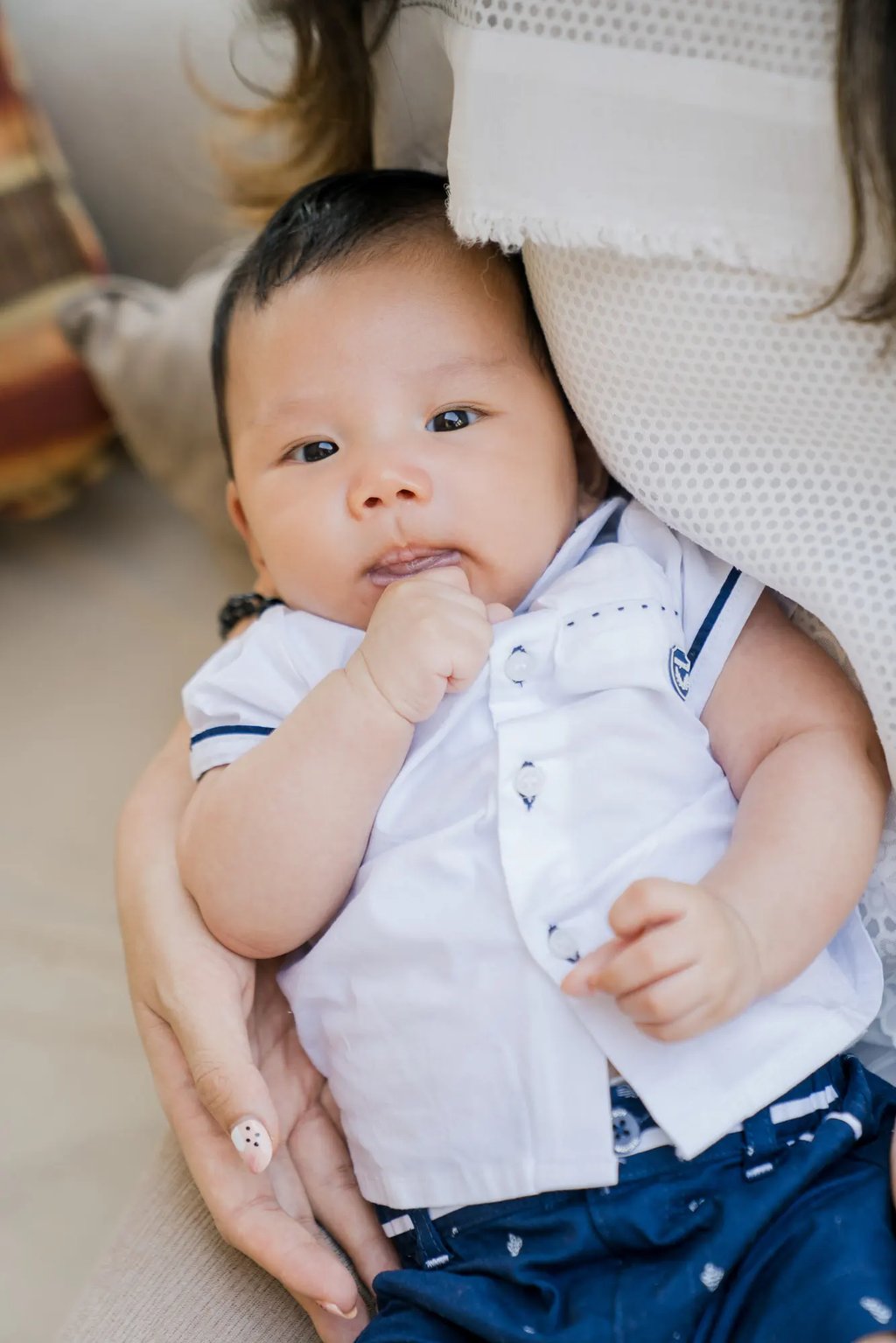 Baby portrait during a family photography session at Samabe Bali Suites & Villas in Nusa Dua.
