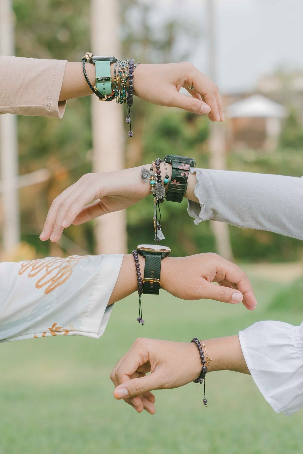 Close detail of friendship bracelets during photoshoot at Candi Beach Resort Karangasem Bali