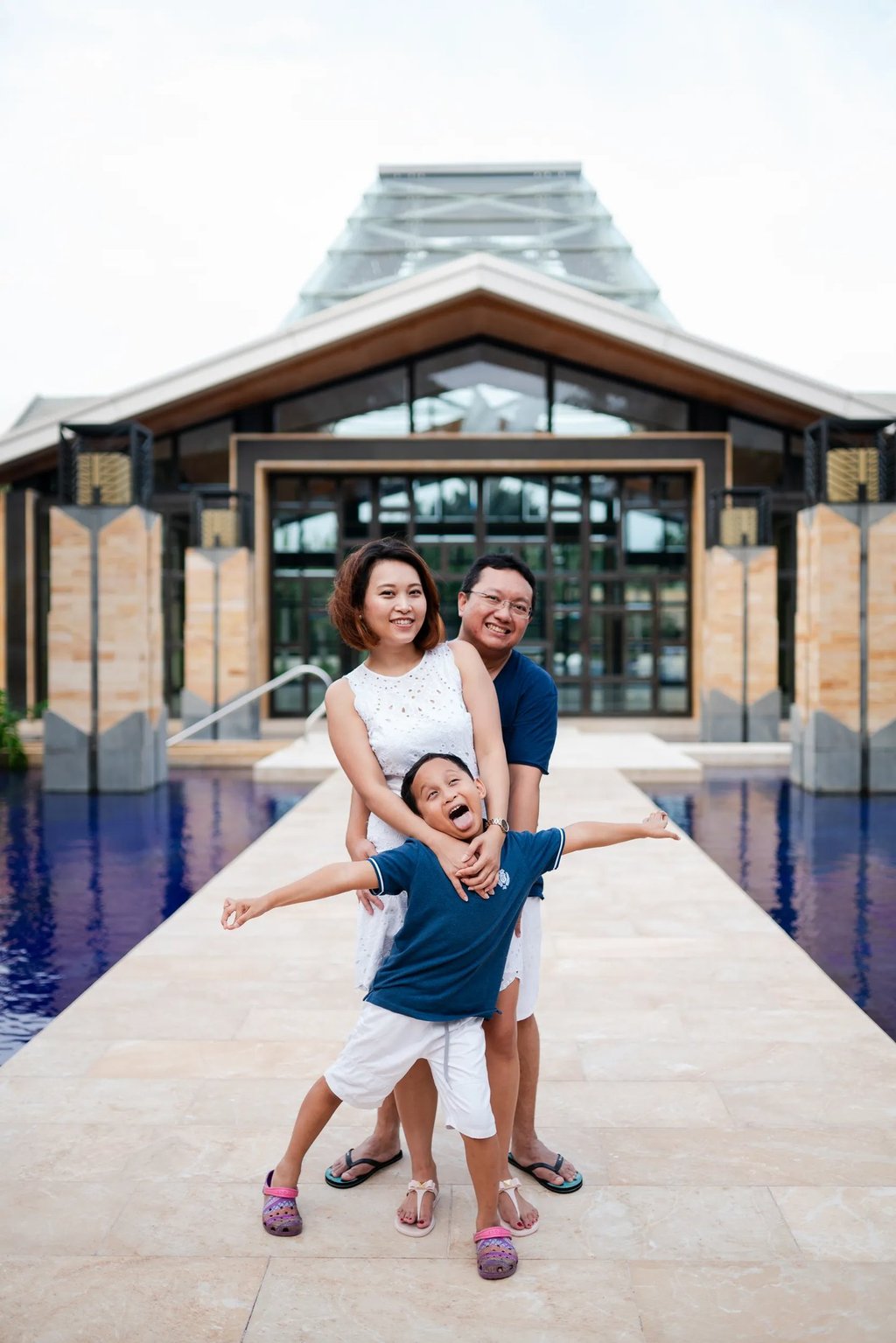 Family portrait near resort entrance at The Mulia Nusa Dua Bali