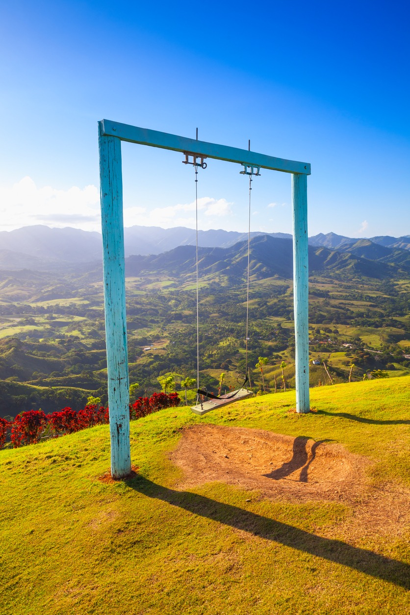 Scenic swing at Montaña Redonda overlooking lush valleys near Los Haitises, Dominican Republic