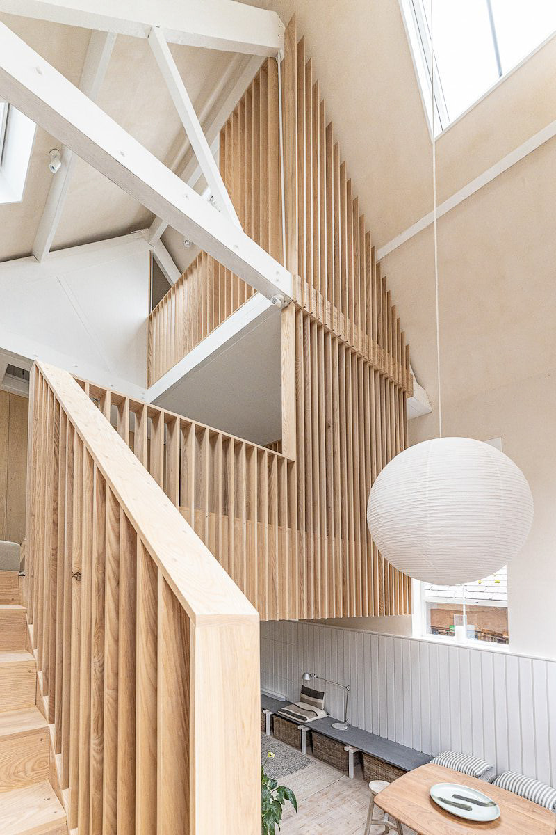 a staircase leading to a loft apartment